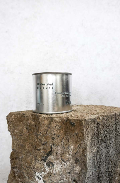 Tin Candle - Understated Beauti - Ylang Ylang, Lotus Blossoms, Patchouli, Camellias, Caramel, Sandalwood